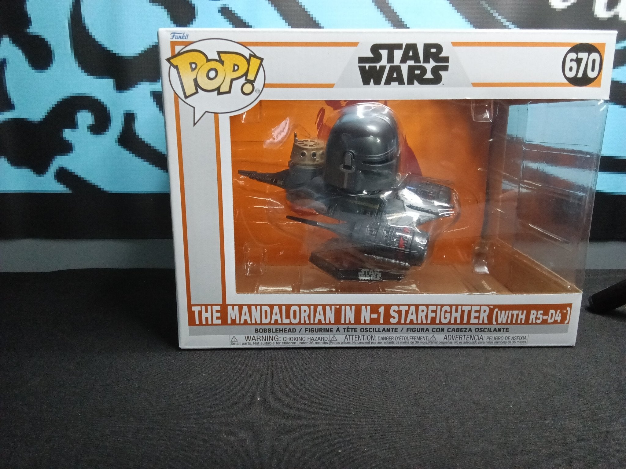 Star Wars - The Mandalorian in Starfighter - Funko 670 - The Cerulean Trove